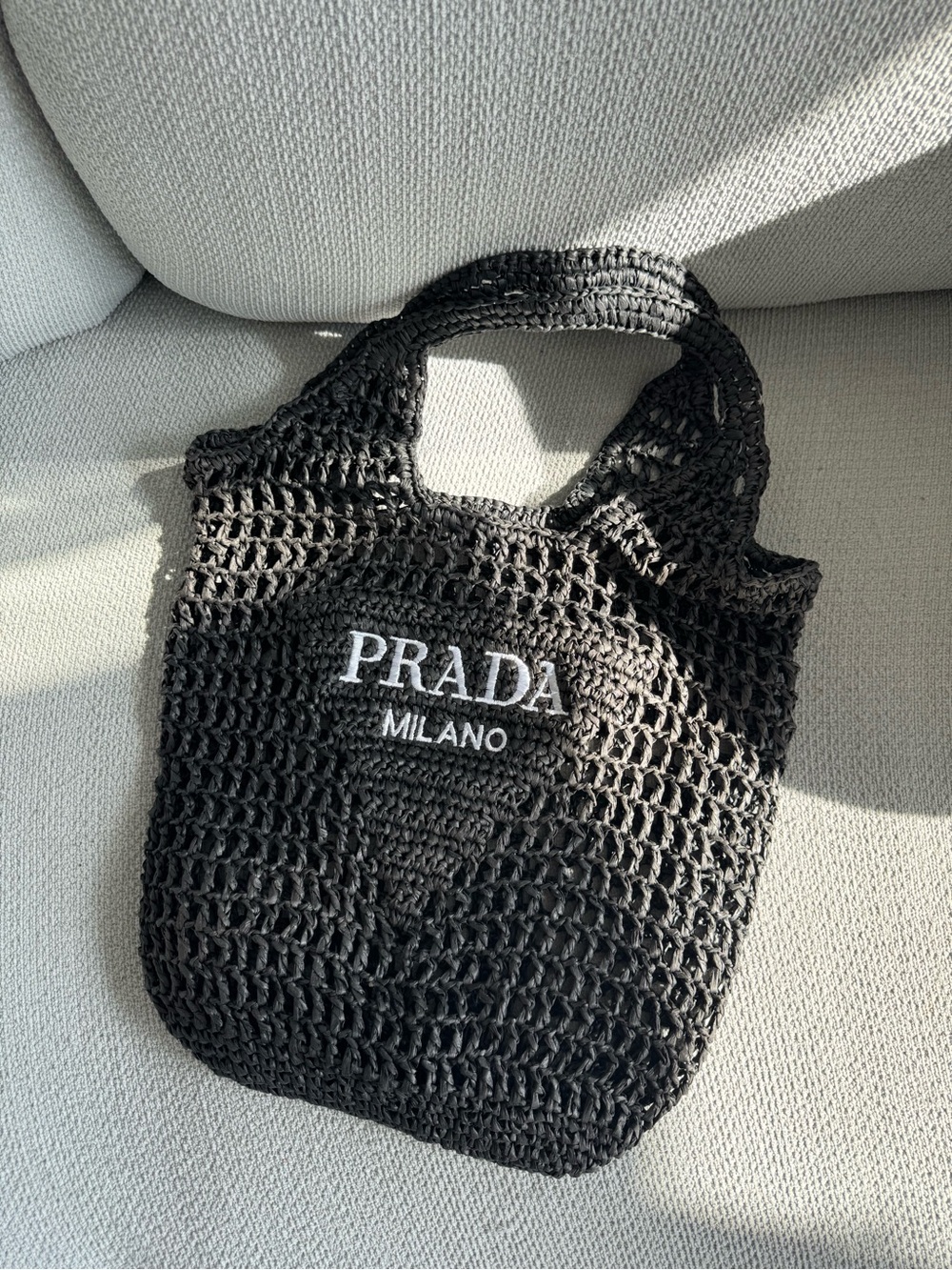 Woven straw tote bag